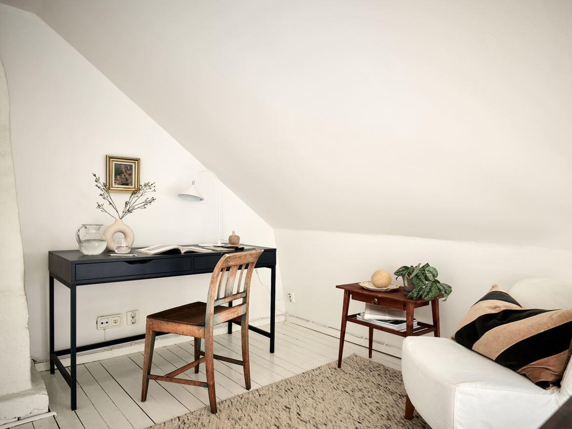 A White Scandinavian Attic Apartment 9 home-office-slanted-ceiling-ikea-alex-desk-nordroom
