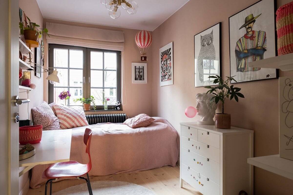 A Swedish Townhouse with a Light Green Kitchen 13 kids-bedroom-pink-walls-desk-nordroom