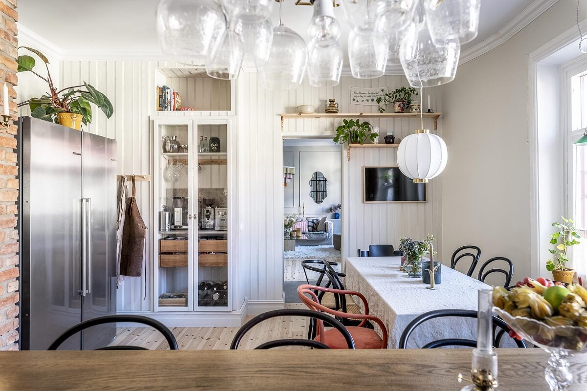 A Swedish Maisonette with a Blue Kitchen and Wallpaper 13 kitchen-dining-room-swedish-maisonette-home-nordroom