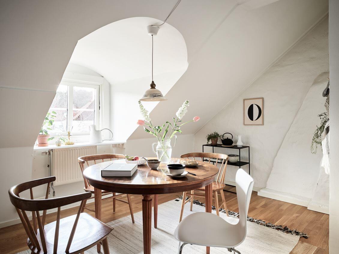 A White Scandinavian Attic Apartment 17 kitchen-dining-table-slanted-walls-attic-apartment-nordroom