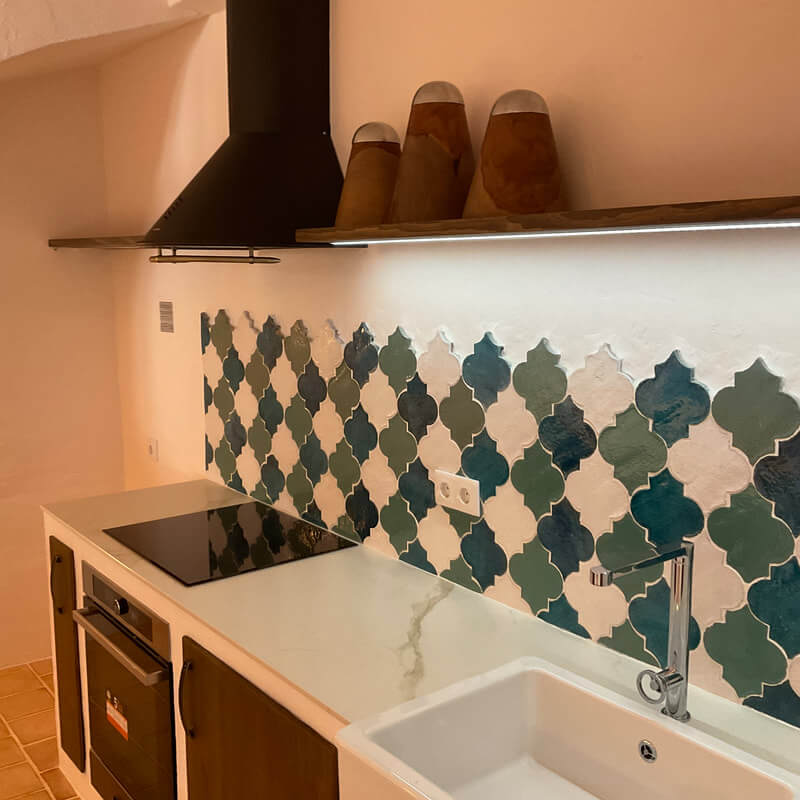 Casita Alborán: A Stylish Home in a Spanish Seaside Town 10 kitchen-marble-worktop-green-backsplash-tiles-nordroom