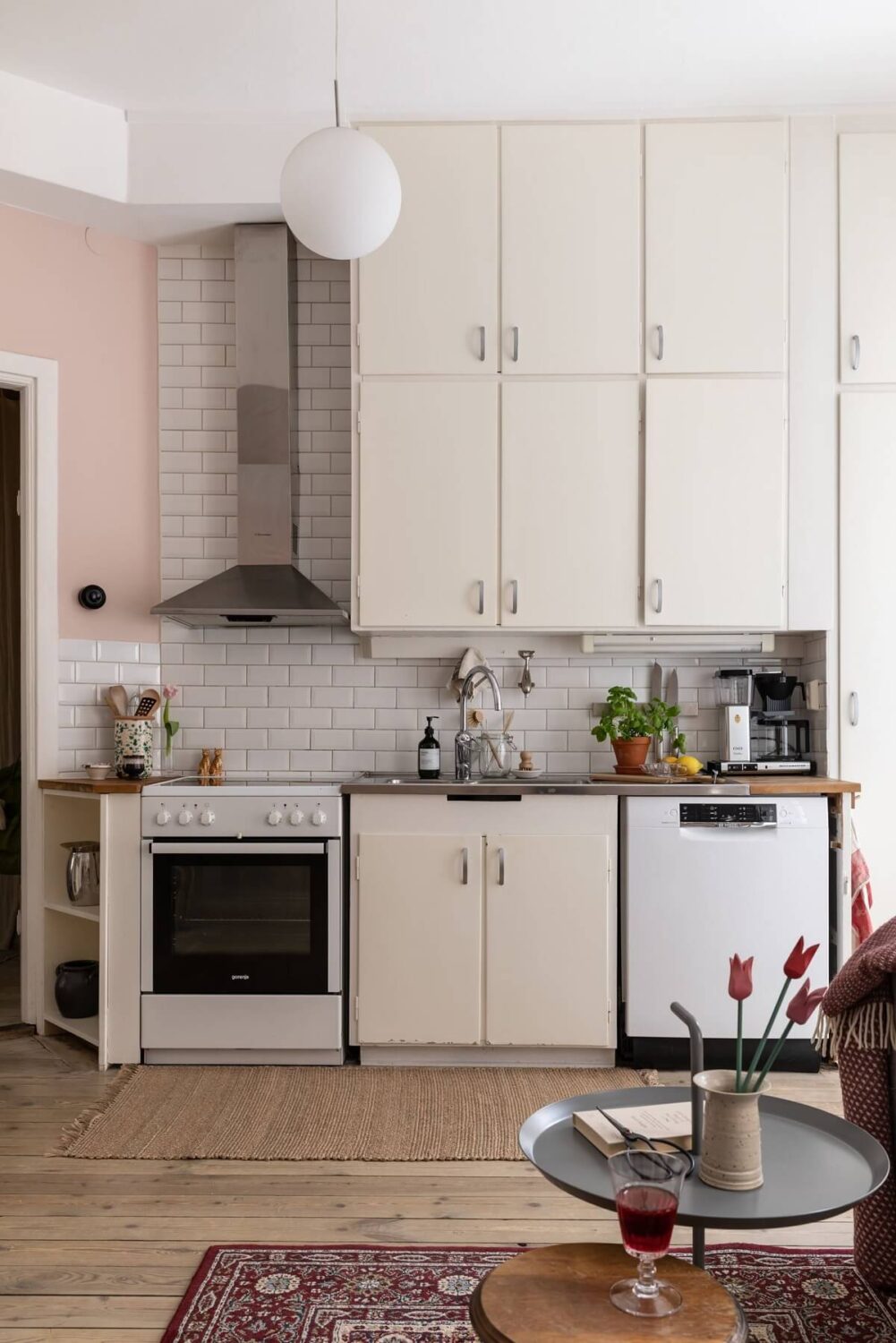 A Pink Living Room in a Scandinavian Apartment 10 kitchen-open-plan-living-room-wooden-floor-nordroom