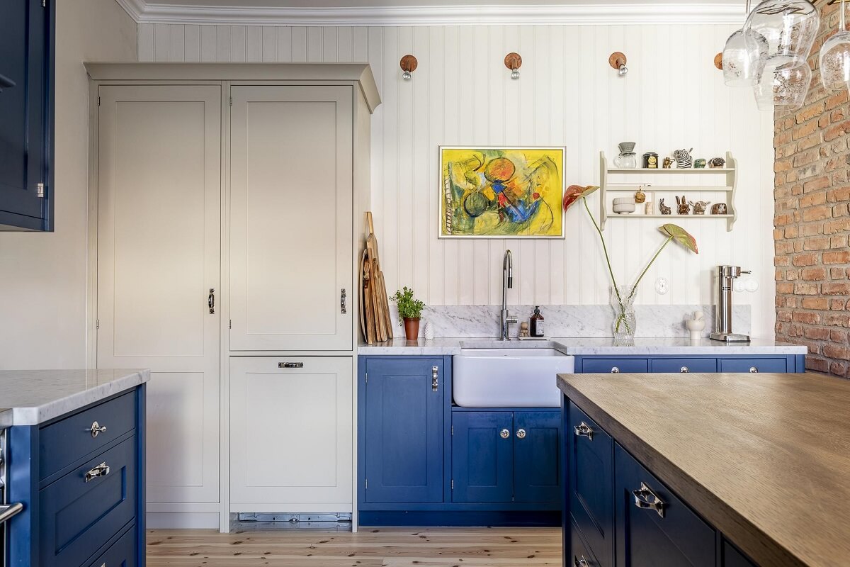 A Swedish Maisonette with a Blue Kitchen and Wallpaper 11 kitchen-wooden-floor-blue-cabinets-butler-sink-nordroom