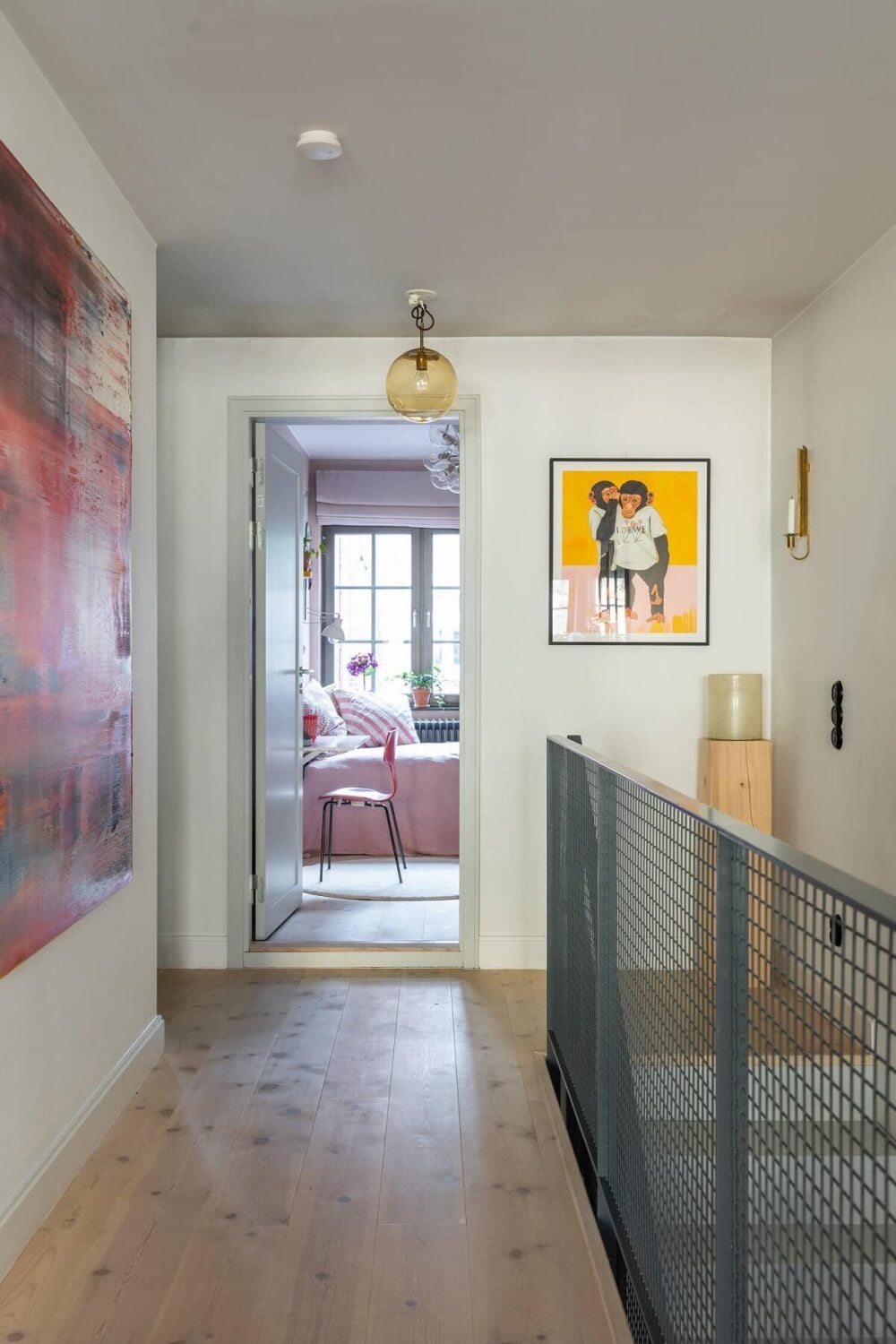 A Swedish Townhouse with a Light Green Kitchen 8 landing-light-scandinavian-townhouse-large-art-nordroom