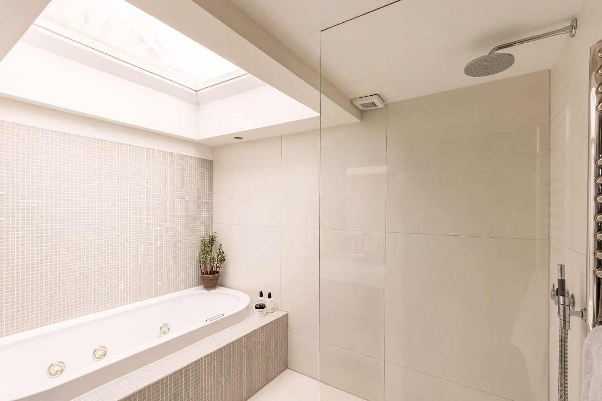 An Amsterdam Penthouse with Green Color Accents 18 light-minimalistic-bathroom-roof-skylight-nordroom