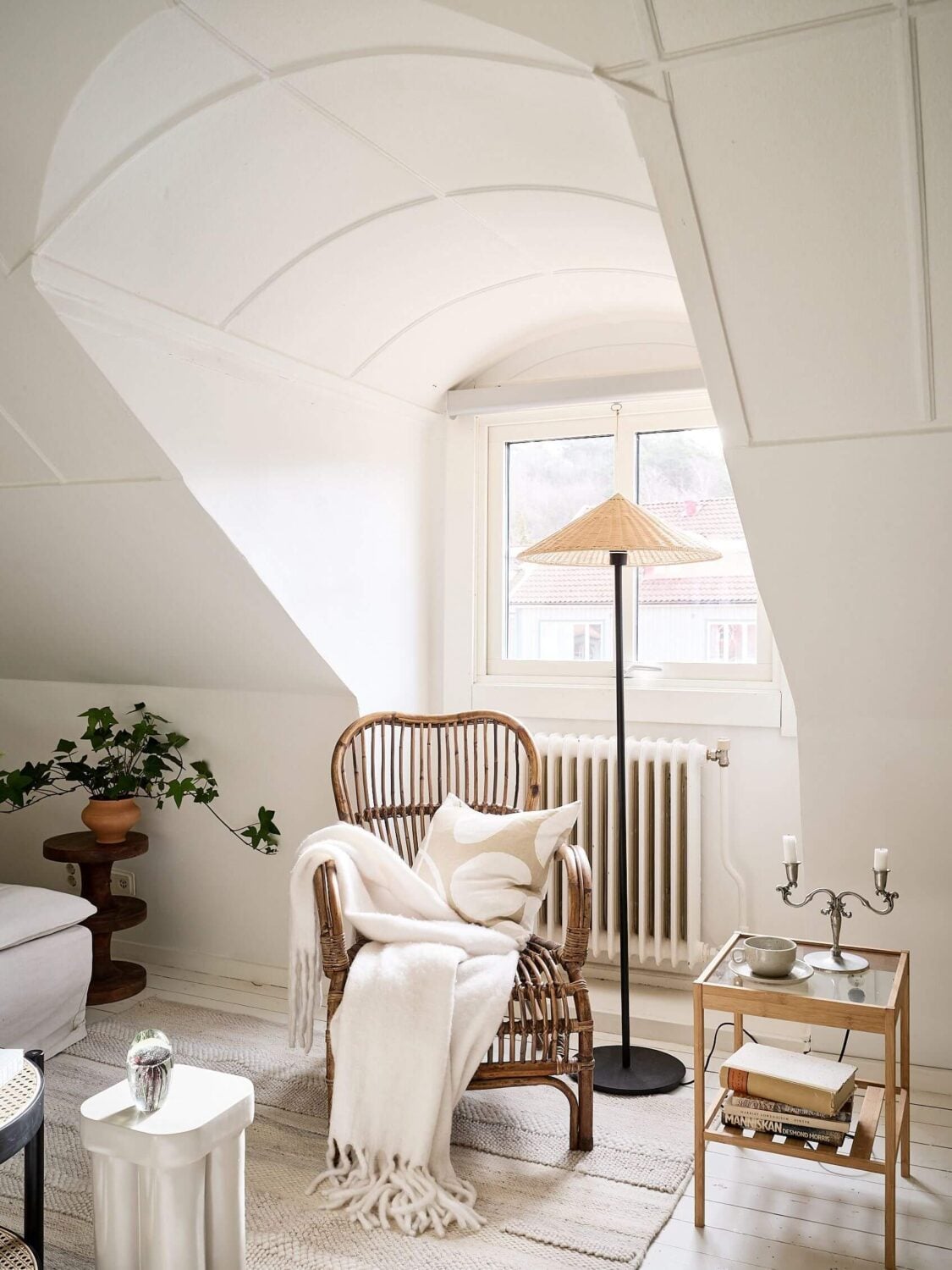 A White Scandinavian Attic Apartment 2 living-room-detail-light-olor-scheme-slanted-walls-nordroom