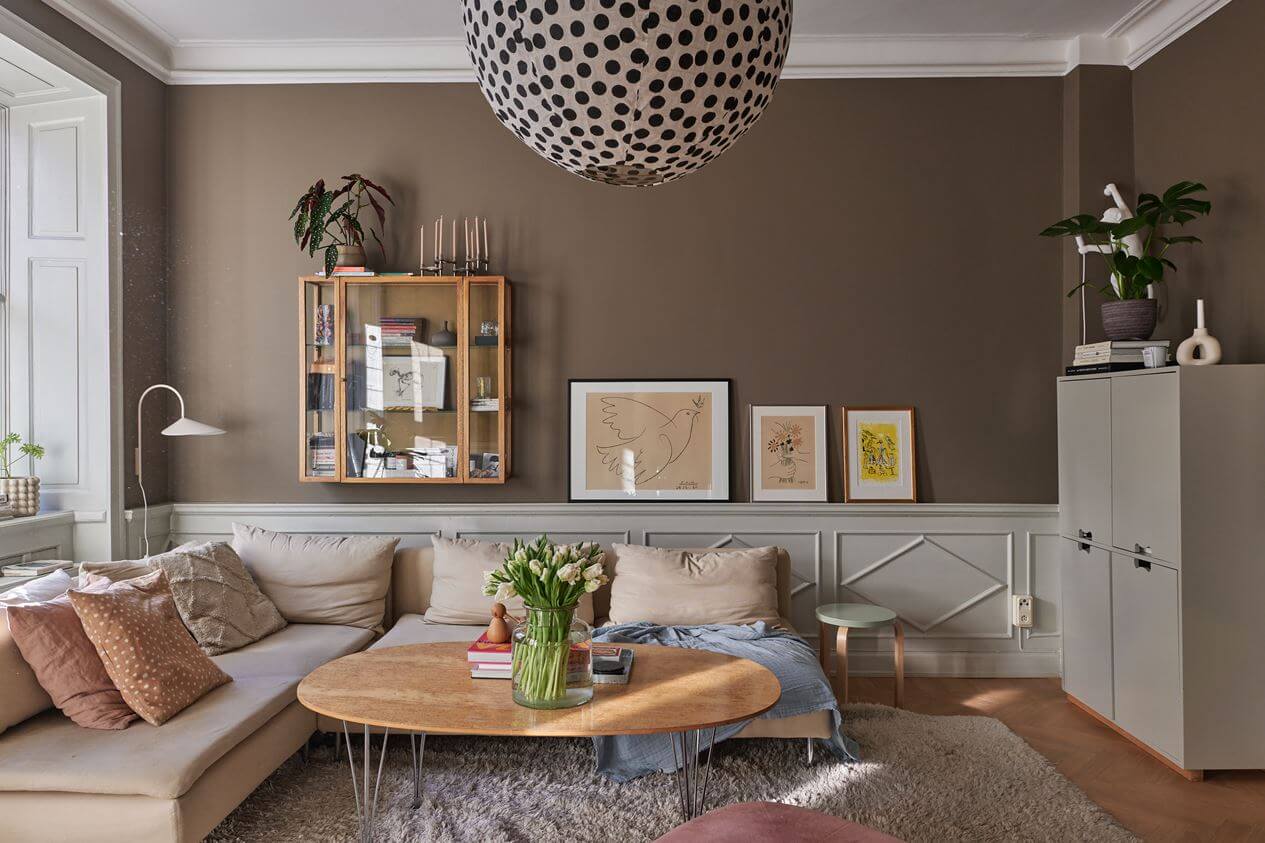 Light Brown Walls in a 17th Century Apartment in Sweden 3 living-room-wooden-paneling-corner-sofa-nordroom