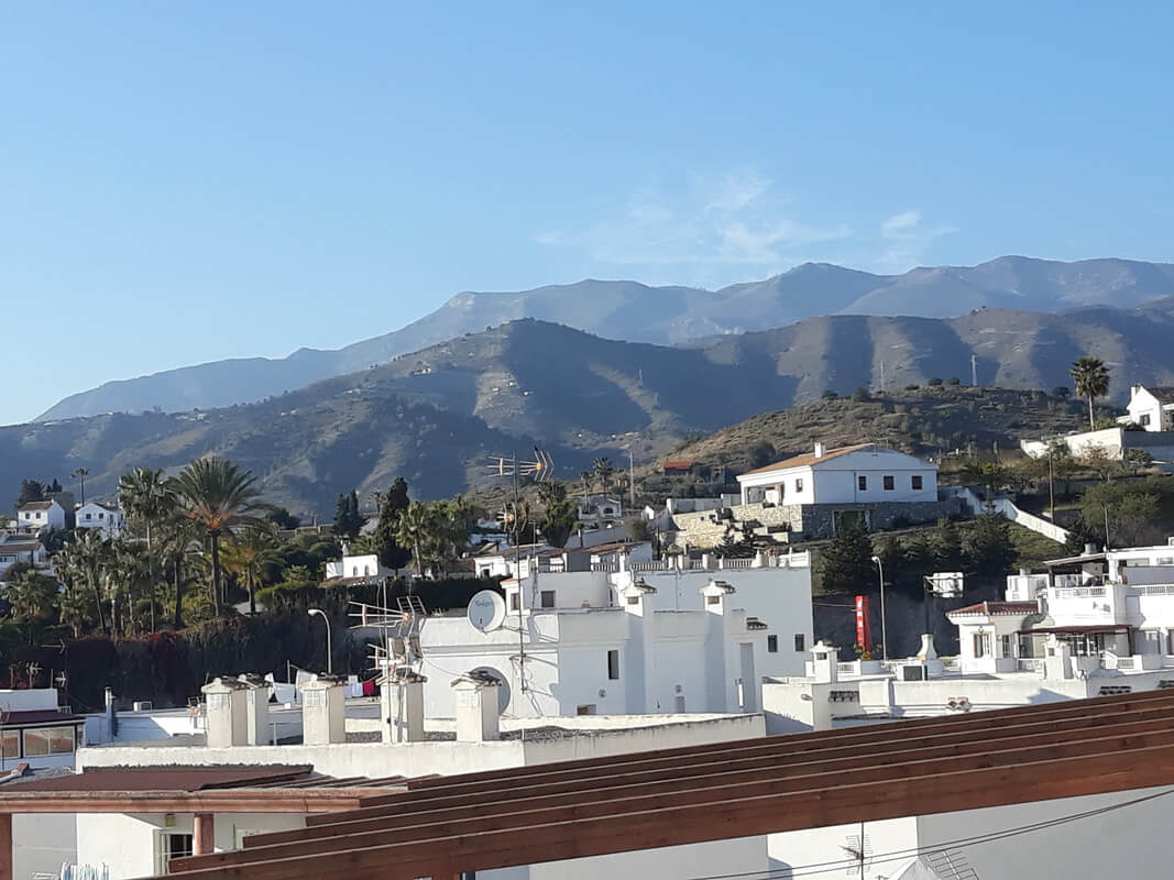 Casita Alborán: A Stylish Home in a Spanish Seaside Town 25 mountain-view-roof-terrace-nordroom