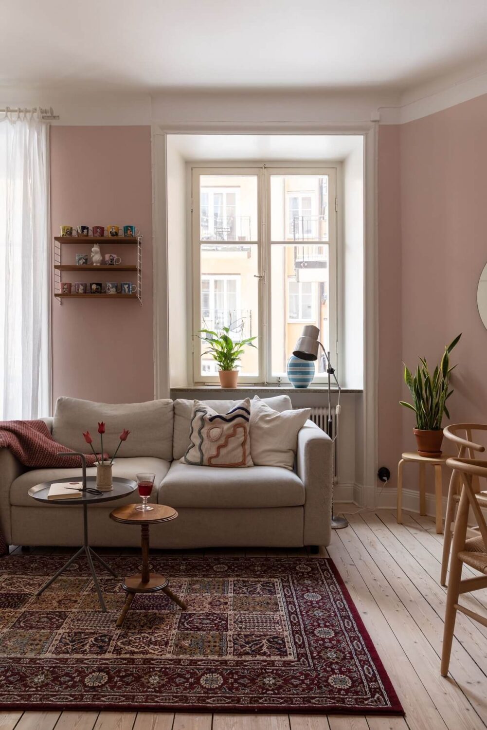 A Pink Living Room in a Scandinavian Apartment 2 pink-living-room-wooden-floor-nordroom