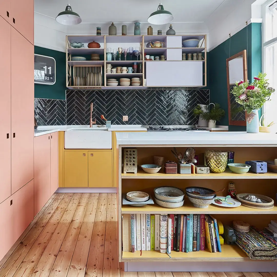57 Stylish Two-Tone Kitchen Cabinet Ideas 44 pluck-kitchen-two-tone-cabinets-yellow-pink-wooden-floor-nordroom