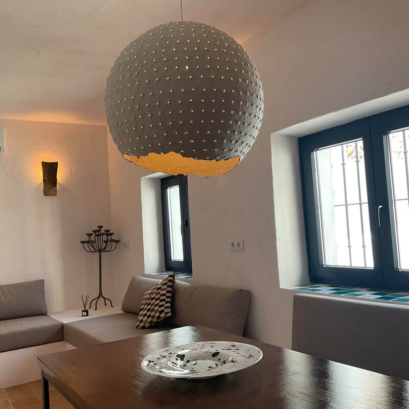 Casita Alborán: A Stylish Home in a Spanish Seaside Town 3 round-pendant-light-living-room-nordroom