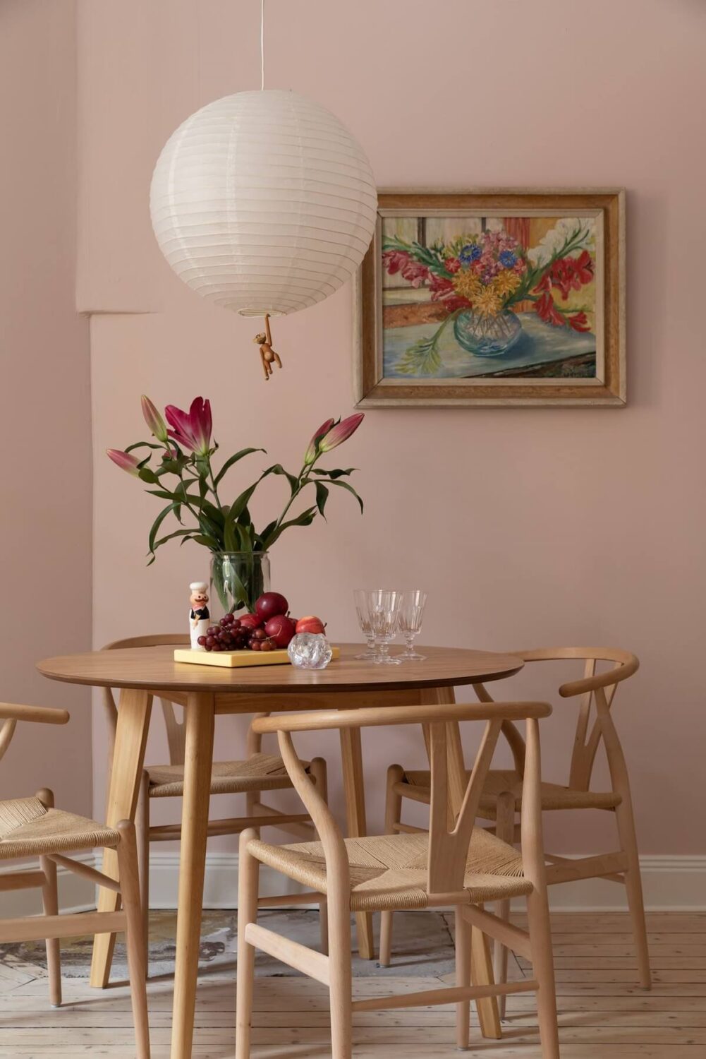 A Pink Living Room in a Scandinavian Apartment 5 round-wooden-dining-table-nordroom