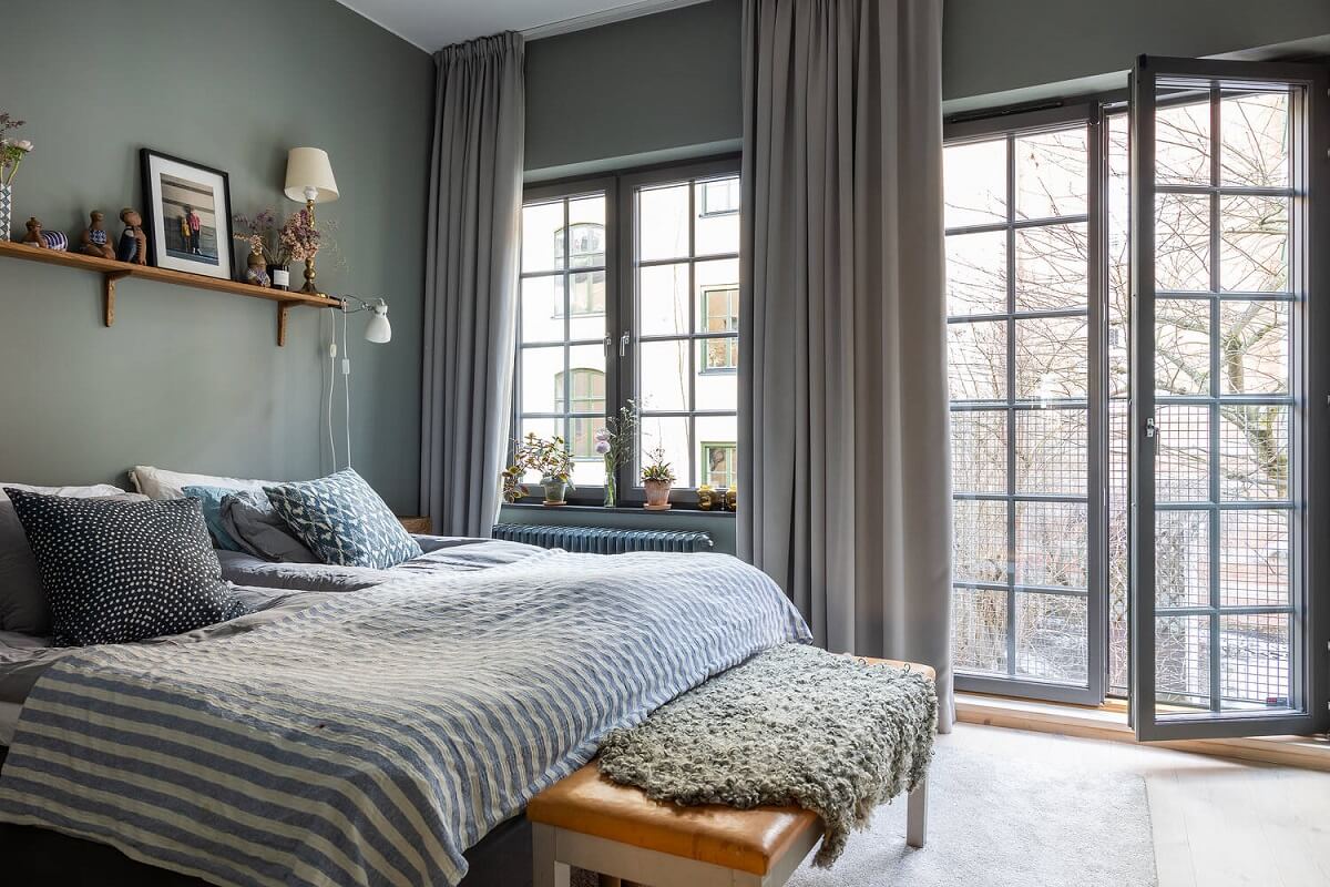 A Swedish Townhouse with a Light Green Kitchen 11 scandinavian-bedroom-gray-walls-nordroom