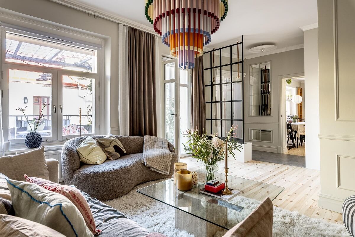 Interior Design Trends for 2024: Comfort, Nature, and Warmth 25 scandinavian-living-room-steel-glass-dividing-wall-nordroom