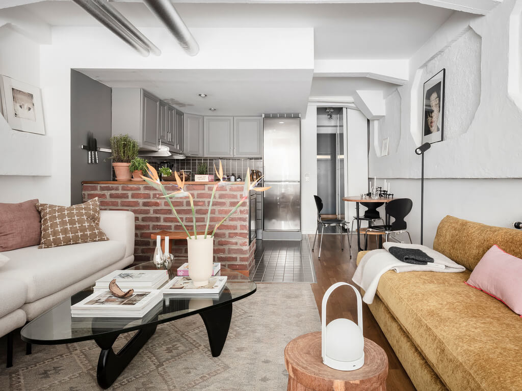 A Scandinavian Loft with Brick Wall and Arched Window 15 seating-area-nordic-loft-apartment-nordroom