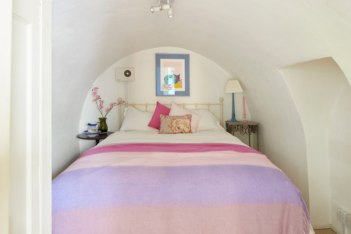 Colorful Rooms and Unique Decor in a Home in Bath 22 small-bedroom-low-arched-ceiling-nordroom