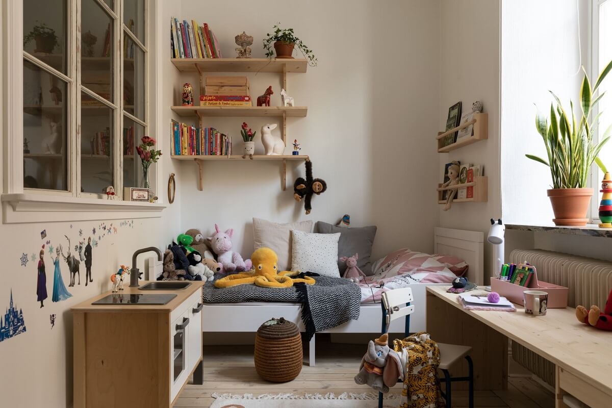 A Pink Living Room in a Scandinavian Apartment 16 small-children-room-shelves-nordroom