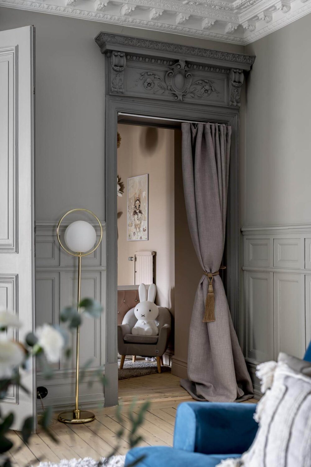 Interior Design Trends for 2024: Comfort, Nature, and Warmth 42 small-doorway-curtain-baby-room-historic-details-nordroom