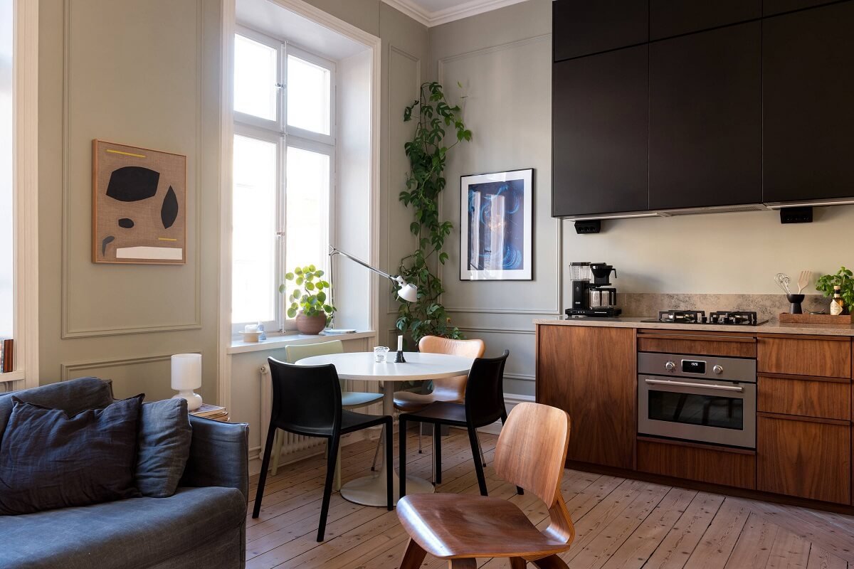 A Small Stockholm Apartment with Lovely Natural Light 1 small-living-room-open kitchen walnut kitchen cabinets