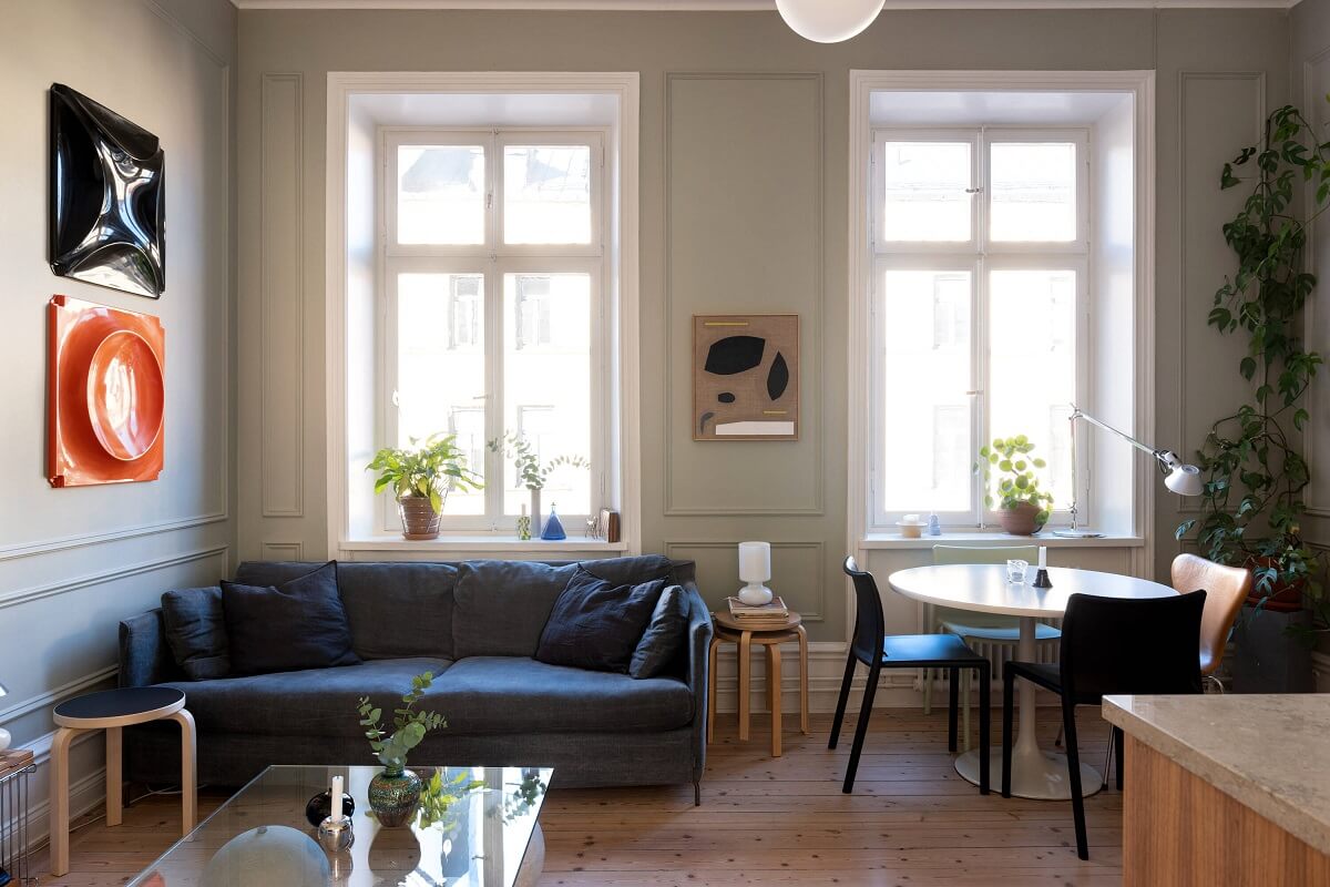 A Small Stockholm Apartment with Lovely Natural Light 6 small open plan living room kitchen wooden floor nordroom