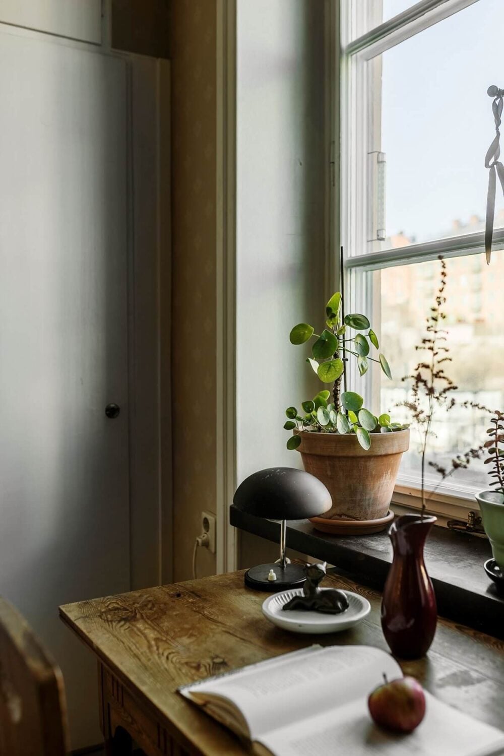 A Vintage Home with a Cozy Reading Room 13 small-wooden-desk-in-front-of-window-nordroom