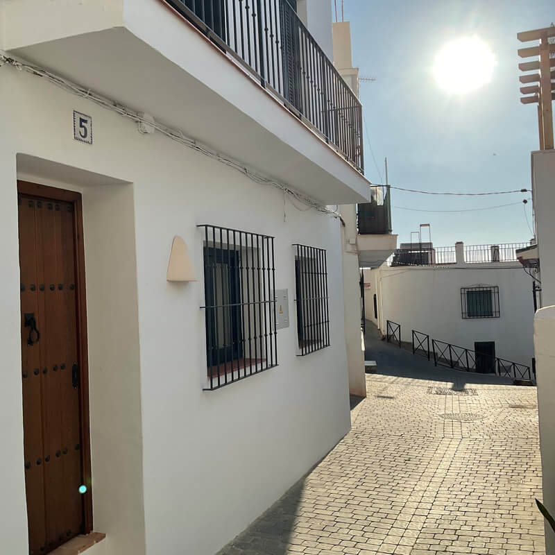 Casita Alborán: A Stylish Home in a Spanish Seaside Town 28 white-facade-street-spanish-town-nordroom