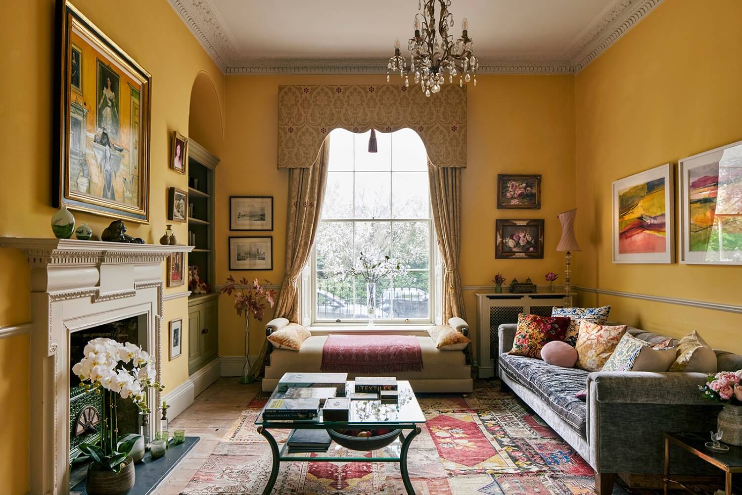 Colorful Rooms and Unique Decor in a Home in Bath 1 yellow-sitting-room-arched-booksleves-nordroom