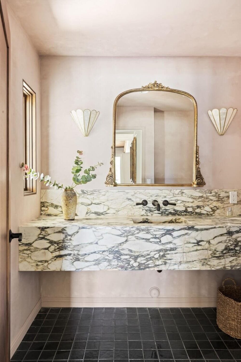 A Beautiful Serene Home in Encino Hills 17 bathroom-marble-sink-gold-mirror-black-floor-tiles-nordroom