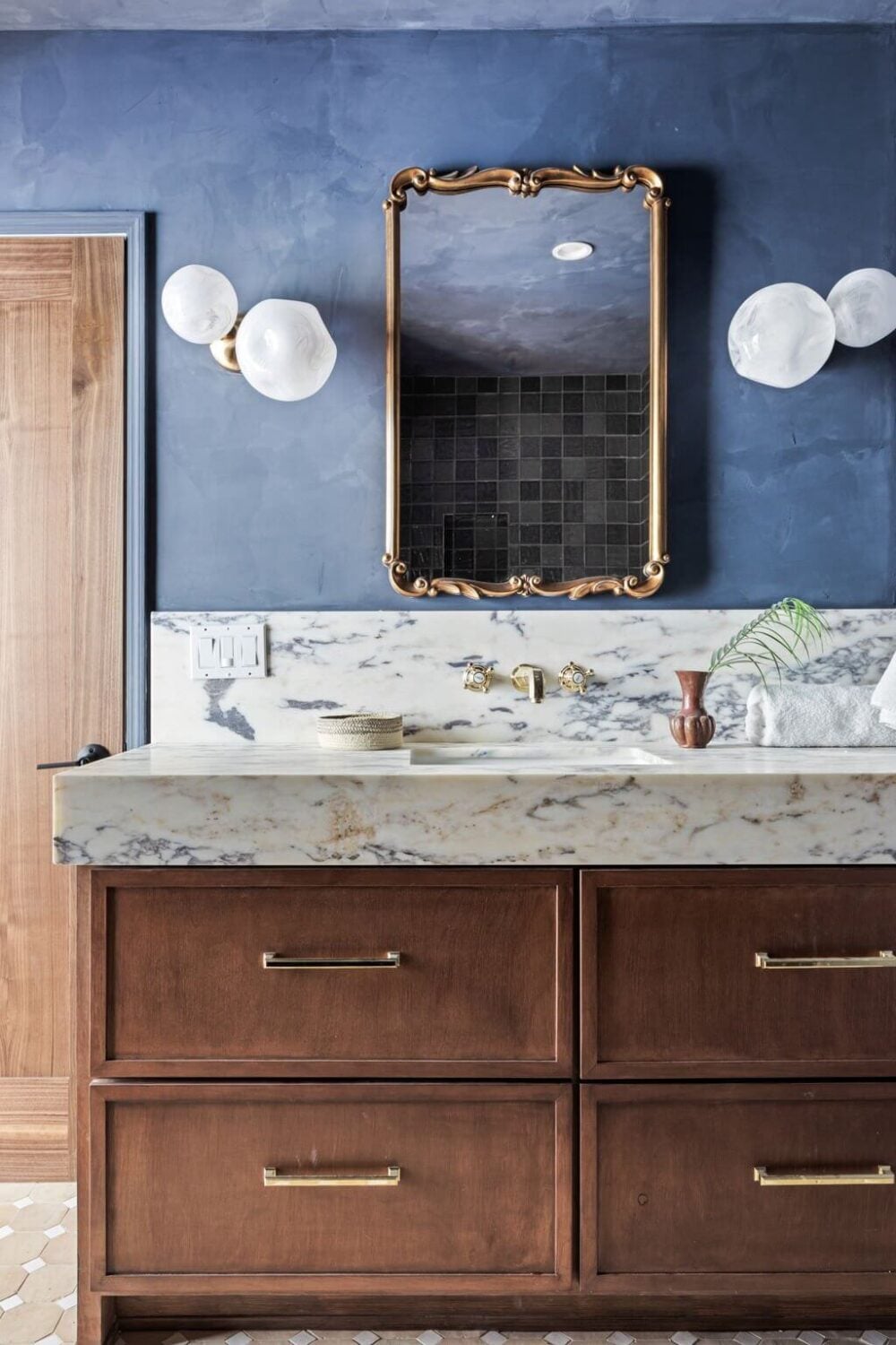 A Beautiful Serene Home in Encino Hills 30 bathroom-wooden-vanity-marble-top-blue-walls-nordroom