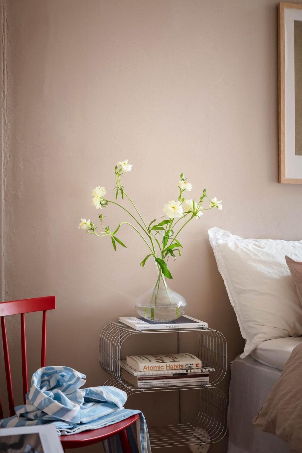 A Stylish Nordic Apartment with a Pink Bedroom 12 bedroom-detail-pink-walls-nordroom