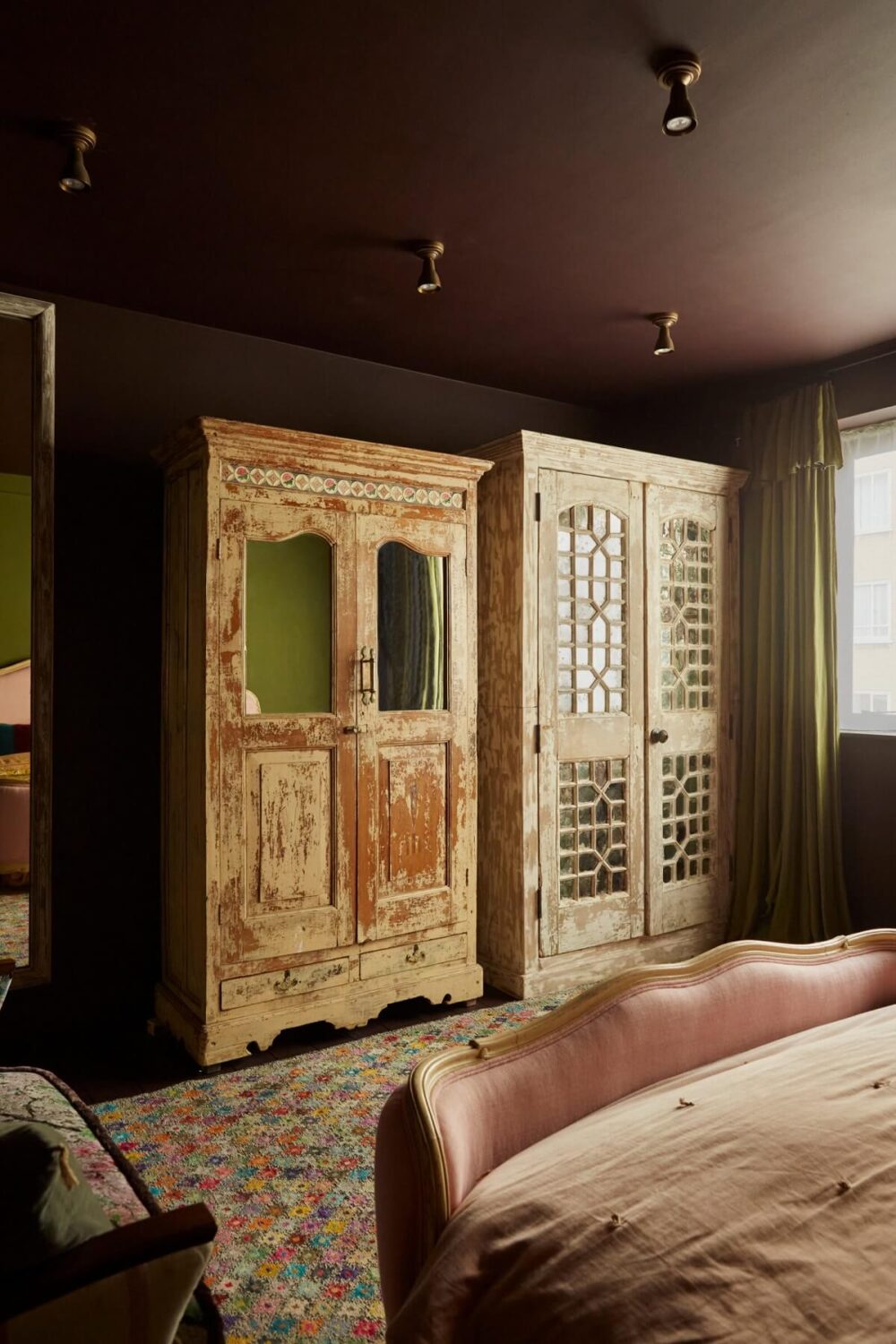 Jewel-Toned Hues in a Vibrant Eclectic Mews House 12 bedroom-mulberry-red-abigail-ahern-antique-wardrobes-nordroom