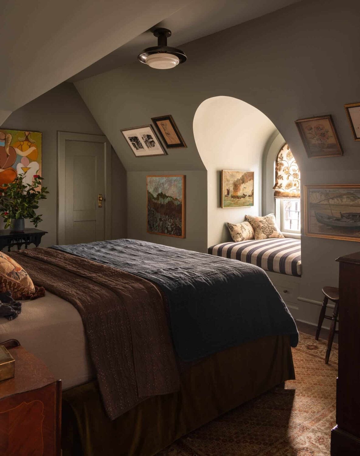 The Top Home Design Trends for 2026: Bold Color, Cozy Corners & Climate-Ready Living 13 bedroom-slanted-ceiling-window-seat-heidi-caillier-design-nordroom