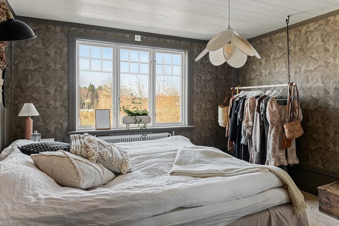 An Idyllic Family Home in the Swedish Countryside 16 bedroom-wallpaper-clothing-rack-swedish-country-house-nordroom