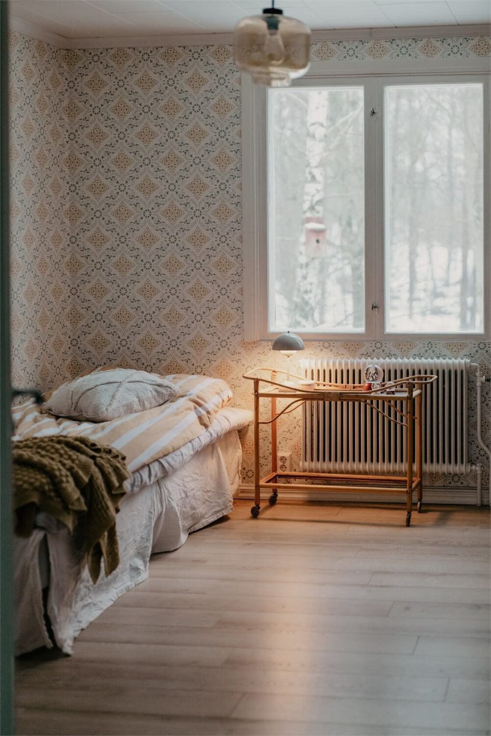 An Idyllic Family Home in the Swedish Countryside 18 bedroom-wallpaper-wooden-floorboards-nordroom