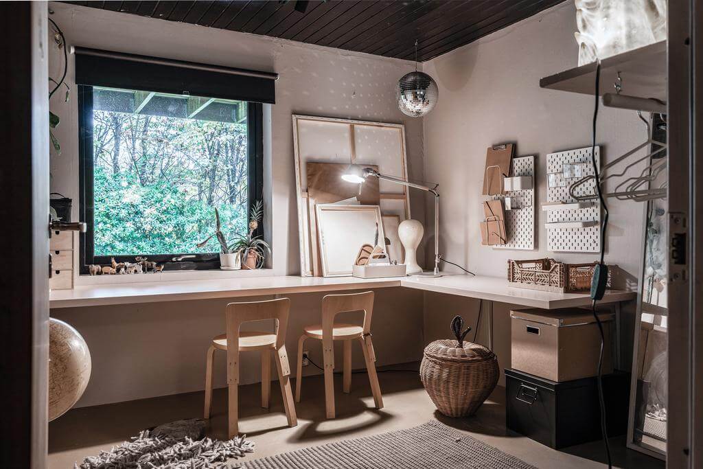 A Renovated Sustainable Home in Sweden 13 built-in-diy-desk-wooden-ceiling-nordroom