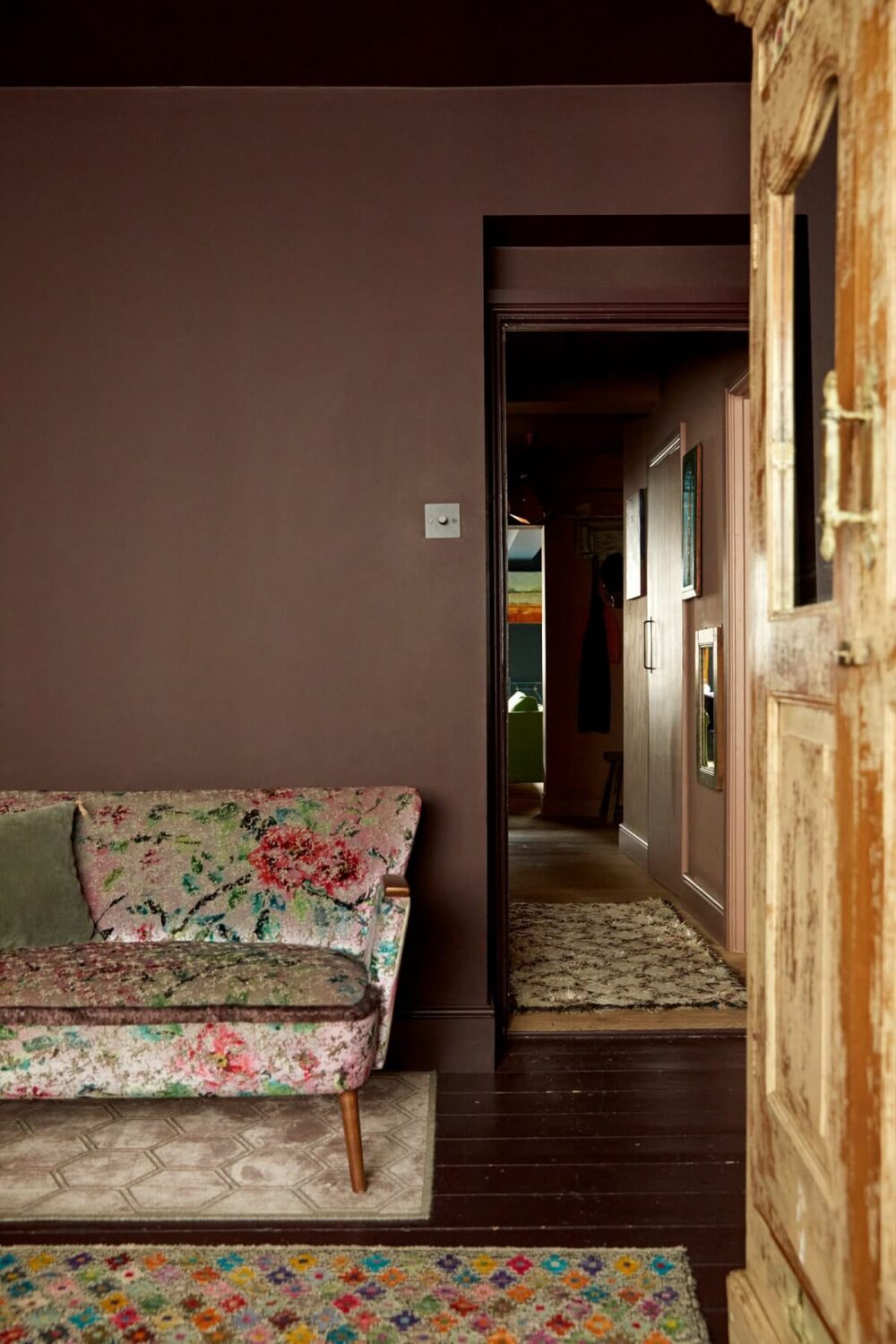 Jewel-Toned Hues in a Vibrant Eclectic Mews House 13 floral-sofa-pink-walls-colorful-mews-nordroom