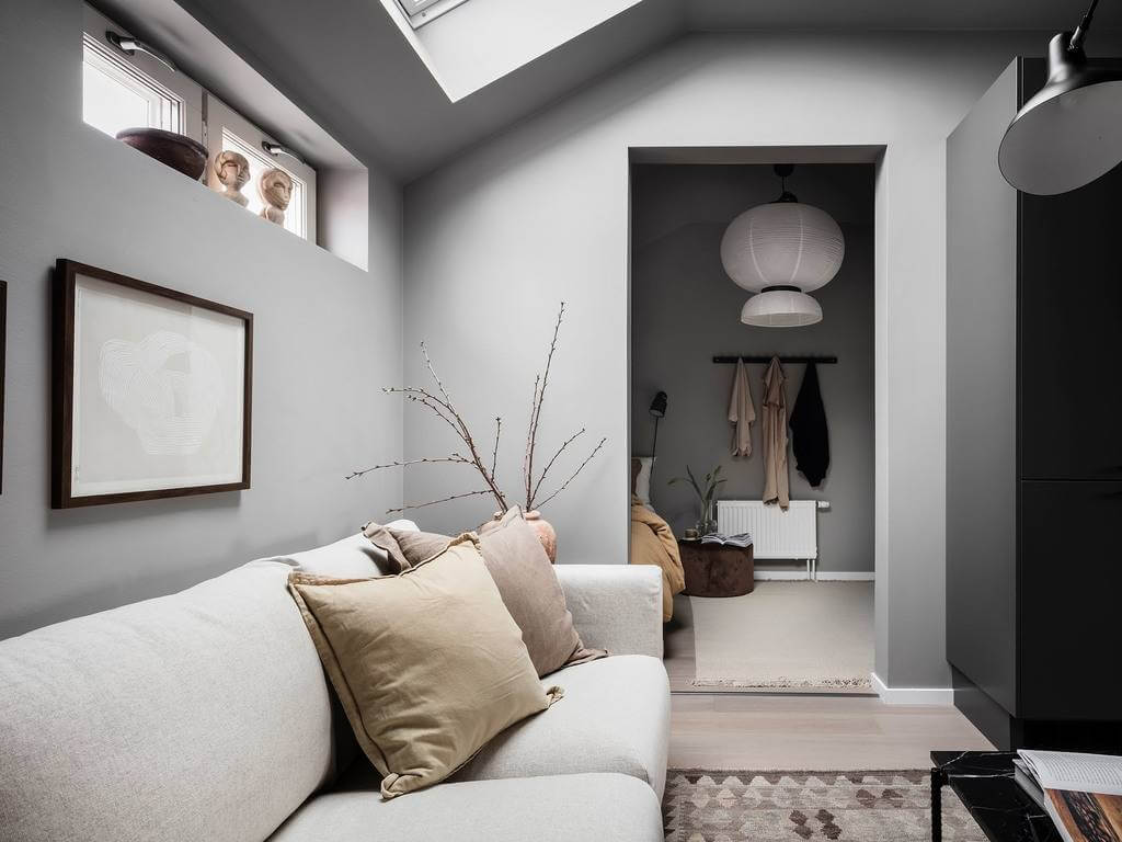 A Small Gray Attic Apartment in Sweden 10 gray-attic-apartment-skylight-bedroom-niche-nordroom