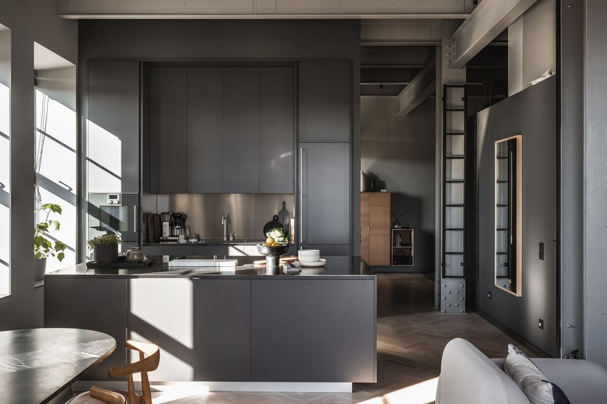 A Modern Gray Industrial Apartment 8 gray-modern-kitchen-floor-to-ceiling-cabinets-nordroom