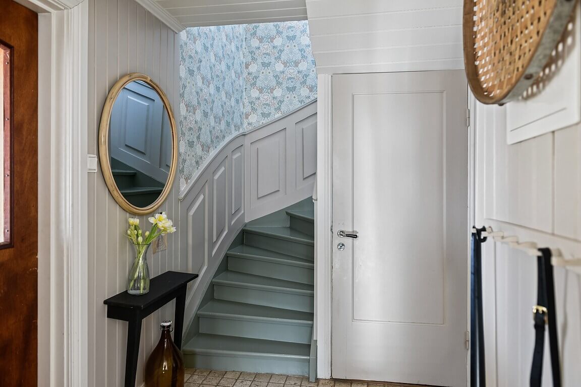 An Idyllic Family Home in the Swedish Countryside 13 hallway-blue-green-staircase-nordroom