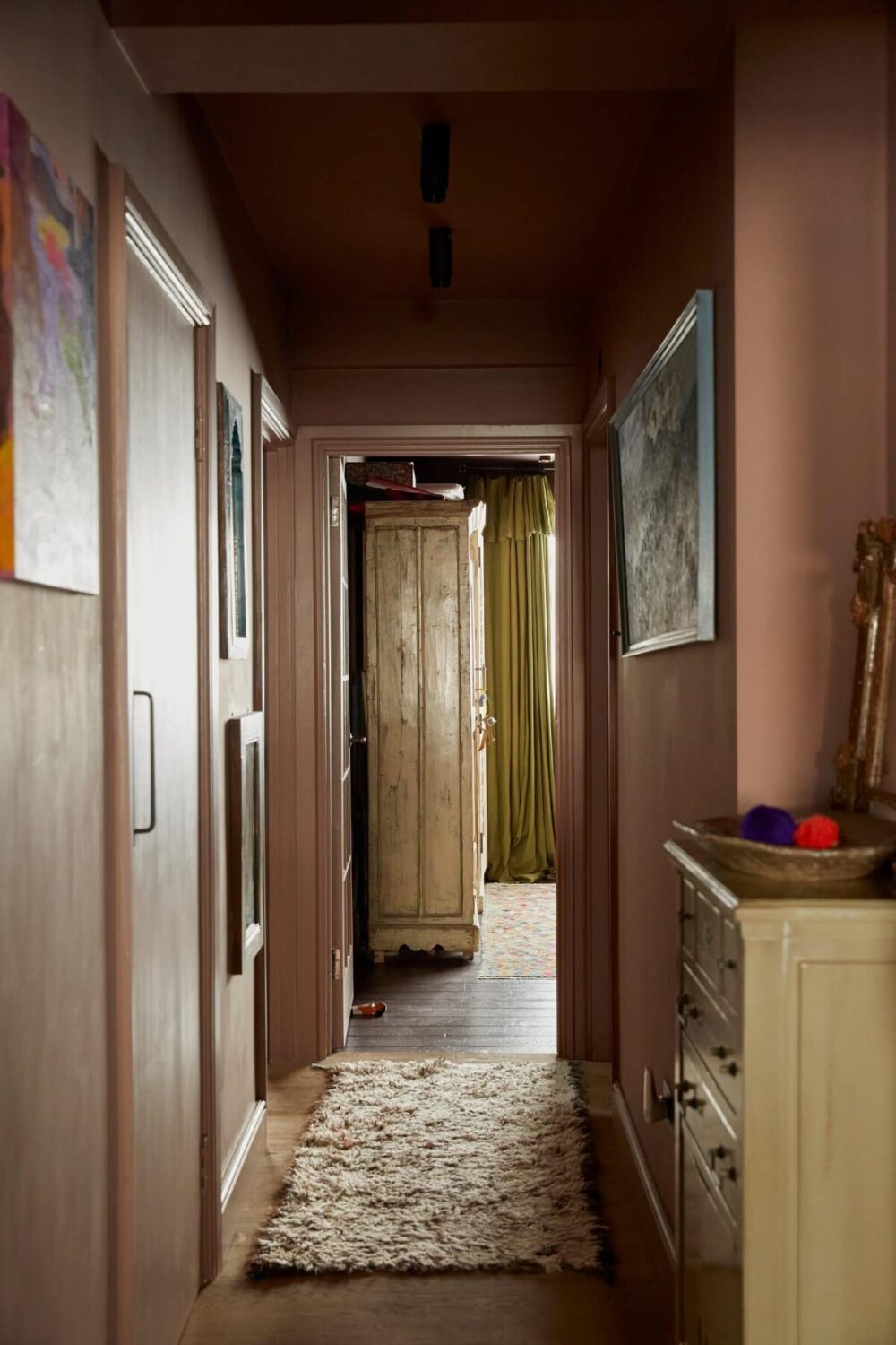 Jewel-Toned Hues in a Vibrant Eclectic Mews House 7 hallway-dusty-pink-walls-nordroom