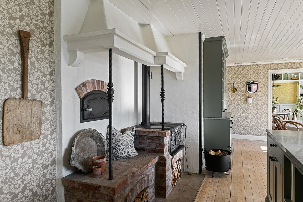 An Idyllic Family Home in the Swedish Countryside 6 historic-wood-stove-country-kitchen-nordroom