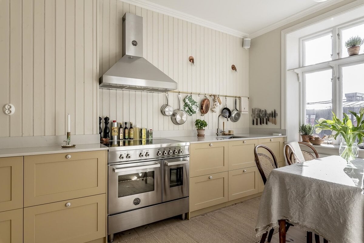 A Scandinavian Apartment with a Pale Yellow Kitchen 14 kitchen-pale-yellow-cupboards-nordroom