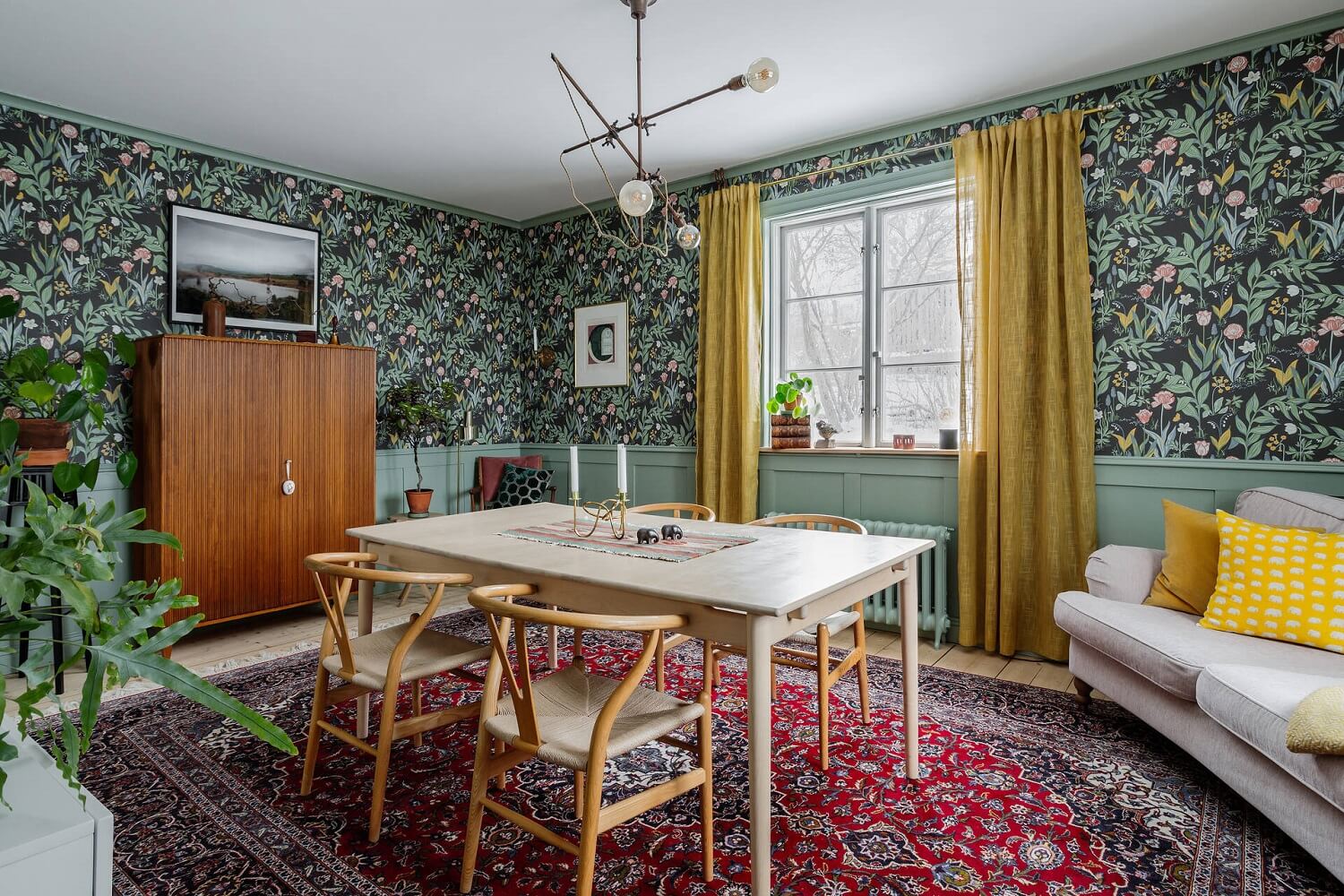 Green Tones and Wallpaper in a Charming Swedish Home 5 living-room-dining-table-spring-garden-borastapeter-wallpaper-yellow-color-accents-nordroom