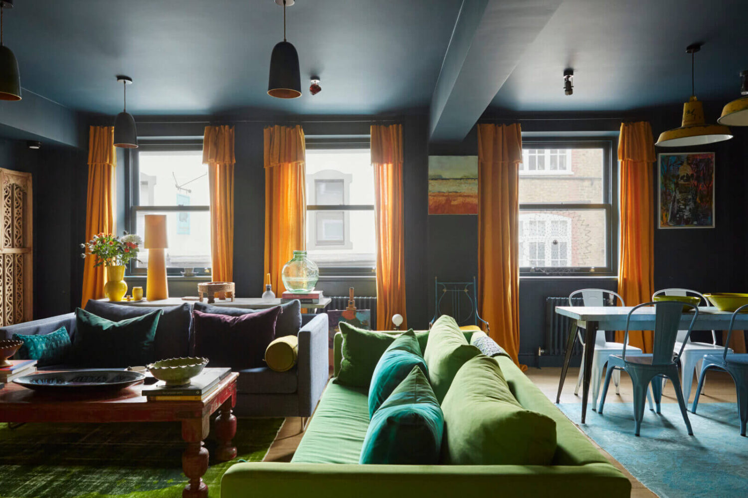 Jewel-Toned Hues in a Vibrant Eclectic Mews House 3 living-room-rivington-blue-abigail-ahern-walls-ceiling-ochre-yellow-curtains-nordoom