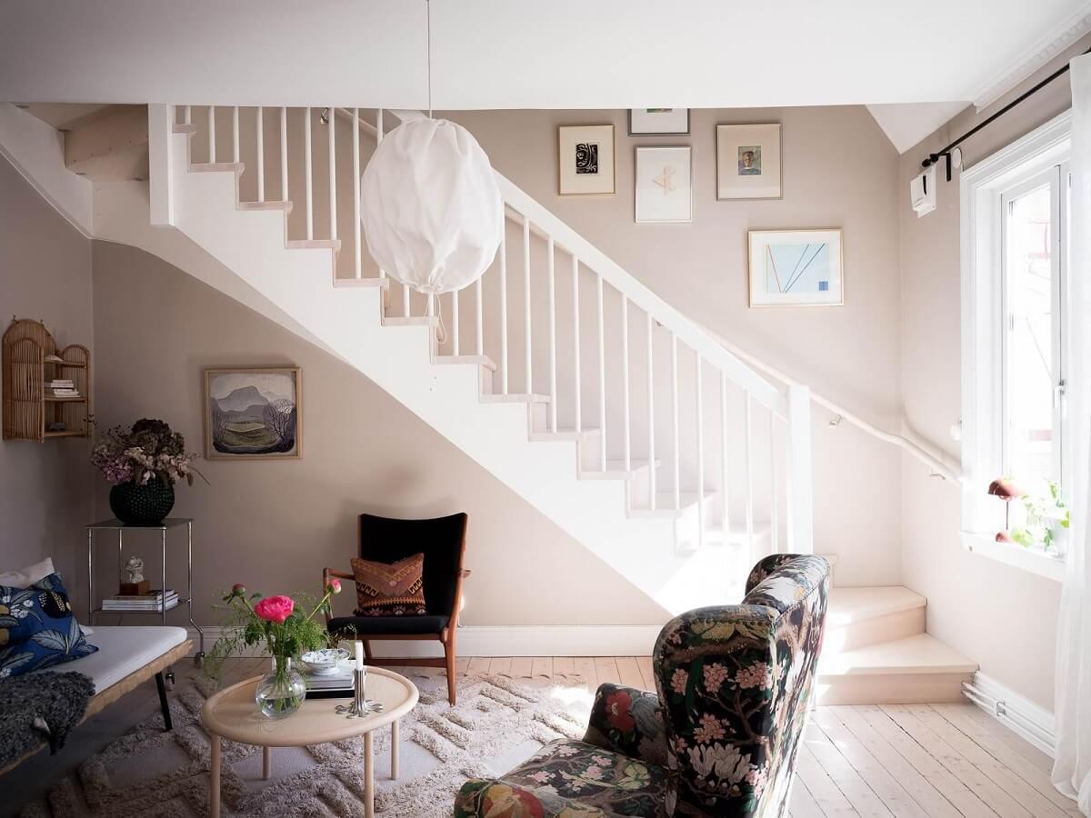 A Scandinavian Duplex That Blends Old and New 3 living-room-stairs-wooden-floorboards-gray-walls-nordroom
