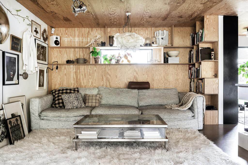 A Renovated Sustainable Home in Sweden 2 living-room-wooden-wall-large-rug-nordroom