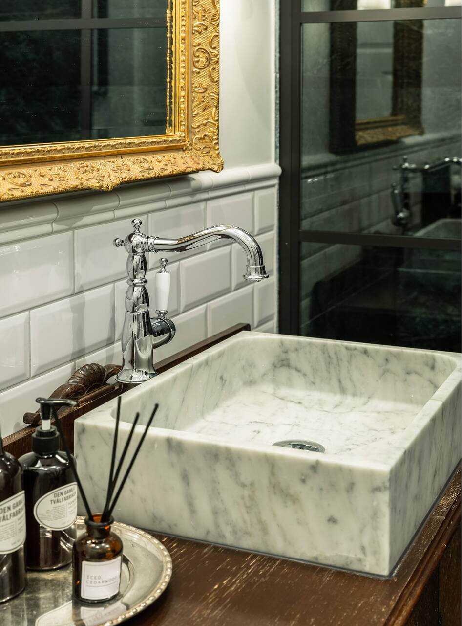 Green Tones and Wallpaper in a Charming Swedish Home 22 marble-sink-bathroom-swedish-country-house-nordroom
