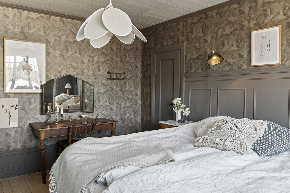 An Idyllic Family Home in the Swedish Countryside 17 master-bedroom-wallpaper-antique-desk-nordroom