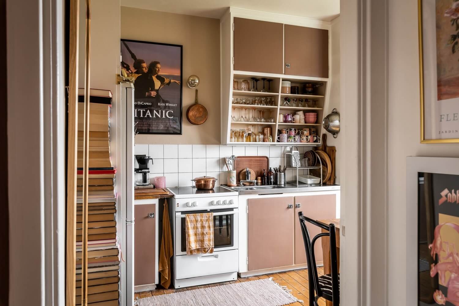 A Pink Studio Apartment with a Midcentury Kitchen 10 midcentury-kitchen-brown-pink-cabinets-nordroom