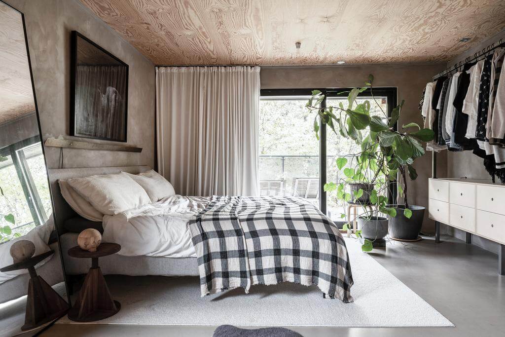 A Renovated Sustainable Home in Sweden 9 monochrome-scandinavian-bedroom-wooden-ceiling-nordroom